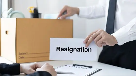 handing in your written letter of resignation.